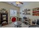 Bright bedroom with carpet, a ceiling fan, and interesting decor at 549 E Quentin Ln, San Tan Valley, AZ 85140