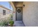 Charming front entrance featuring a decorative wreath and a 'WELCOME' doormat at 549 E Quentin Ln, San Tan Valley, AZ 85140
