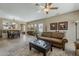 Spacious living room and dining area with natural light and tiled flooring at 549 E Quentin Ln, San Tan Valley, AZ 85140