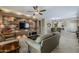 Comfortable living room with a stone accent wall and modern furniture at 549 E Quentin Ln, San Tan Valley, AZ 85140