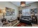Cozy living area featuring comfortable seating, natural light, and stylish decor at 549 E Quentin Ln, San Tan Valley, AZ 85140