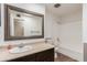 Bathroom featuring a vanity with a sink, a toilet, and a shower tub combo at 6009 W Medlock Dr, Glendale, AZ 85301