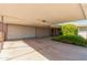 Covered carport provides ample parking space and convenient access to the home's entrance at 6009 W Medlock Dr, Glendale, AZ 85301