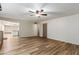 Spacious living room with beautiful flooring, ample natural light, and open layout at 6009 W Medlock Dr, Glendale, AZ 85301