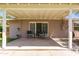 Covered patio area featuring two chairs and a small table at 6009 W Medlock Dr, Glendale, AZ 85301