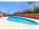 Sparkling pool with landscaped surroundings for outdoor enjoyment at 6009 W Medlock Dr, Glendale, AZ 85301