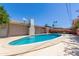 Sparkling pool in private backyard with mature trees and shade at 6009 W Medlock Dr, Glendale, AZ 85301
