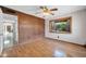This bright bedroom has hardwood floors and a bay window to let in the natural light at 6217 W Orange Dr, Glendale, AZ 85301