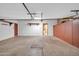 This garage features a large storage area and a door to the house at 6217 W Orange Dr, Glendale, AZ 85301