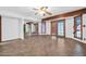 The living room features tile floors, natural light, and exposed wood beams, creating a warm and inviting atmosphere at 6217 W Orange Dr, Glendale, AZ 85301