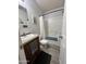 Bathroom with vanity, laminate floors, and shower with curtain at 625 W Mckellips Rd # 358, Mesa, AZ 85201