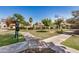 Lush green space with walking paths offers residents a serene environment to relax and enjoy the outdoors at 633 W Southern Ave # 1181, Tempe, AZ 85282