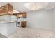 Bright kitchen with tile floors featuring matching appliances and ample counter space at 633 W Southern Ave # 1181, Tempe, AZ 85282