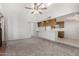 Bright living room with high ceilings that flows seamlessly to the kitchen area at 633 W Southern Ave # 1181, Tempe, AZ 85282
