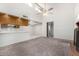 Cozy living room with a fireplace, flowing through to the kitchen and dining areas at 633 W Southern Ave # 1181, Tempe, AZ 85282