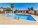 Community pool area featuring a sparkling blue pool, jacuzzi, and lounge area for relaxation and social gatherings at 633 W Southern Ave # 1181, Tempe, AZ 85282