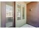 A cozy balcony area with a sliding glass door and windows, offering natural light at 6605 N 93Rd Ave # 1035, Glendale, AZ 85305