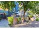 Stylish exterior featuring multiple levels with private patio space and mature landscaping at 706 E Washington St # 124, Phoenix, AZ 85034