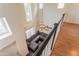 A spacious living room with high ceilings, hardwood floors, and modern furnishings at 706 E Washington St # 124, Phoenix, AZ 85034