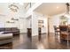Spacious living room with tall ceilings, dark wood floors, and stylish open-concept design at 706 E Washington St # 124, Phoenix, AZ 85034
