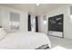 Bedroom features a balcony, modern decor, and bright, sunny windows at 706 E Washington St # 124, Phoenix, AZ 85034