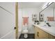 Bright bathroom featuring a soaking tub, modern vanity, and hexagon tile floors at 7428 E Cambridge Ave, Scottsdale, AZ 85257