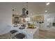 Modern kitchen featuring an island with a quartz countertop and stainless steel appliances at 7428 E Cambridge Ave, Scottsdale, AZ 85257