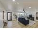 Inviting living room showcasing hardwood floors, a large window, and stylish furnishings at 7428 E Cambridge Ave, Scottsdale, AZ 85257