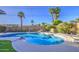 Backyard pool surrounded by desert landscaping and block fencing for privacy and low maintenance at 7428 E Cambridge Ave, Scottsdale, AZ 85257