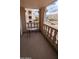 Balcony with nice views, a glass table, and a decorative railing at 7910 E Camelback Rd # 302, Scottsdale, AZ 85251