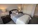 Cozy bedroom with a queen-size bed, matching nightstands, and plenty of natural light at 7910 E Camelback Rd # 302, Scottsdale, AZ 85251