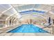 Bask in year-round enjoyment with this bright, indoor swimming pool, offering a serene and private aquatic experience at 7910 E Camelback Rd # 302, Scottsdale, AZ 85251