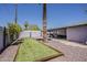 Inviting backyard featuring a bocce ball court, desert landscaping, covered patio and plenty of room for outdoor activities at 8137 E Indian School Rd, Scottsdale, AZ 85251