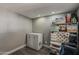 Basement space with extra storage, shelving, and a chest freezer at 8137 E Indian School Rd, Scottsdale, AZ 85251
