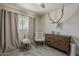 Bright Bedroom with natural light features modern furniture and decor, creating a comfortable space at 8137 E Indian School Rd, Scottsdale, AZ 85251