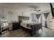 The main bedroom features a ceiling fan, hardwood floors, and access to the backyard at 8137 E Indian School Rd, Scottsdale, AZ 85251