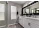Bright bathroom with double sink vanity, modern fixtures, and plenty of counter space at 8720 W Willowbrook Dr, Peoria, AZ 85382