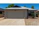 Charming single-story home featuring a two-car garage and well-maintained landscaping at 8720 W Willowbrook Dr, Peoria, AZ 85382