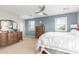 Spacious bedroom with neutral carpet and two windows bringing in natural light at 905 S Osborn Ln, Gilbert, AZ 85296