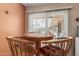Cozy dining area with a round table, perfect for enjoying meals with a view at 10439 W Kingswood Cir, Sun City, AZ 85351