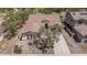 Bird's eye view of a tile roof home with desert landscaping and a paved driveway at 12360 W Eagle Ridge Ln, Peoria, AZ 85383