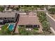 Aerial view of a single-story home with a private pool, patio, and artificial turf in the backyard at 12360 W Eagle Ridge Ln, Peoria, AZ 85383