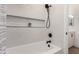 Clean bathroom with a shower-tub combination and modern fixtures at 12360 W Eagle Ridge Ln, Peoria, AZ 85383