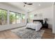 Bright, airy bedroom with ample natural light and wood floors at 12360 W Eagle Ridge Ln, Peoria, AZ 85383