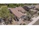 Aerial view of a single-story home featuring a well-maintained tile roof and desert landscaping at 12360 W Eagle Ridge Ln, Peoria, AZ 85383