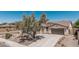 Charming front exterior with a tile roof, gravel yard, and desert landscaping at 12360 W Eagle Ridge Ln, Peoria, AZ 85383