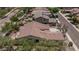 Aerial view of a single-story home with an in-ground pool, patio, and desert landscaping at 12360 W Eagle Ridge Ln, Peoria, AZ 85383