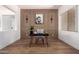 Clean-lined office space with lion art piece and decorative moulding at 12360 W Eagle Ridge Ln, Peoria, AZ 85383