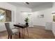 Minimalist office space with lots of natural light and wood floors at 12360 W Eagle Ridge Ln, Peoria, AZ 85383