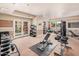 A fitness center with weights, bench, punching bag, and exercise balls at 14575 W Mountain View Blvd # 12309, Surprise, AZ 85374